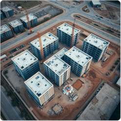 Mission-critical industrial facility with distillation towers, storage tanks, and piping